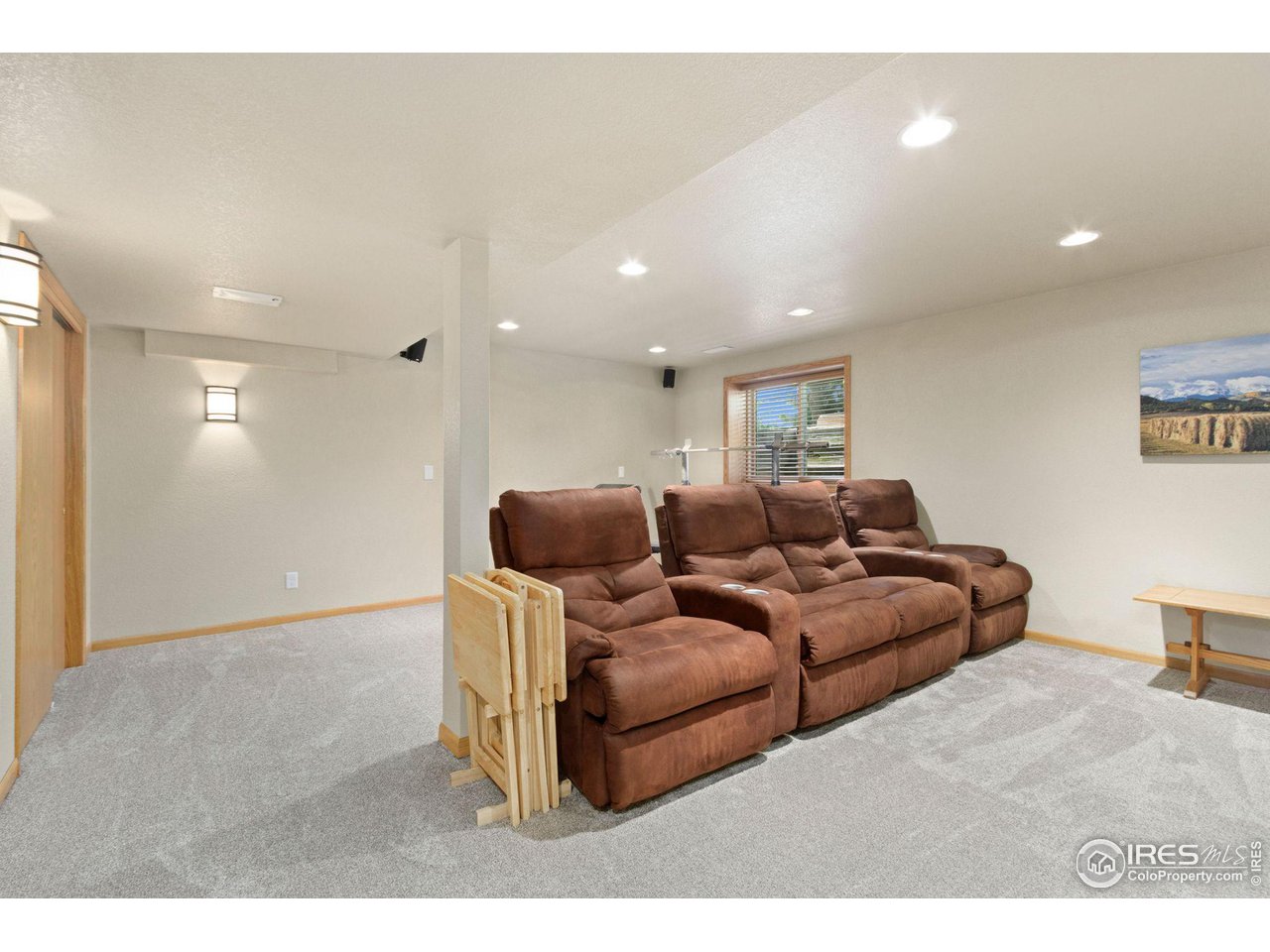 6363 Compton Road Fort Collins, CO 80525 - Photo 27 of 40 Recreation room in basement with loads of storage and area to work out