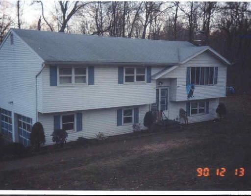 2 Old Towantic Road Oxford, CT 06478 - Photo 1 of 1 a front view of a house with a yard