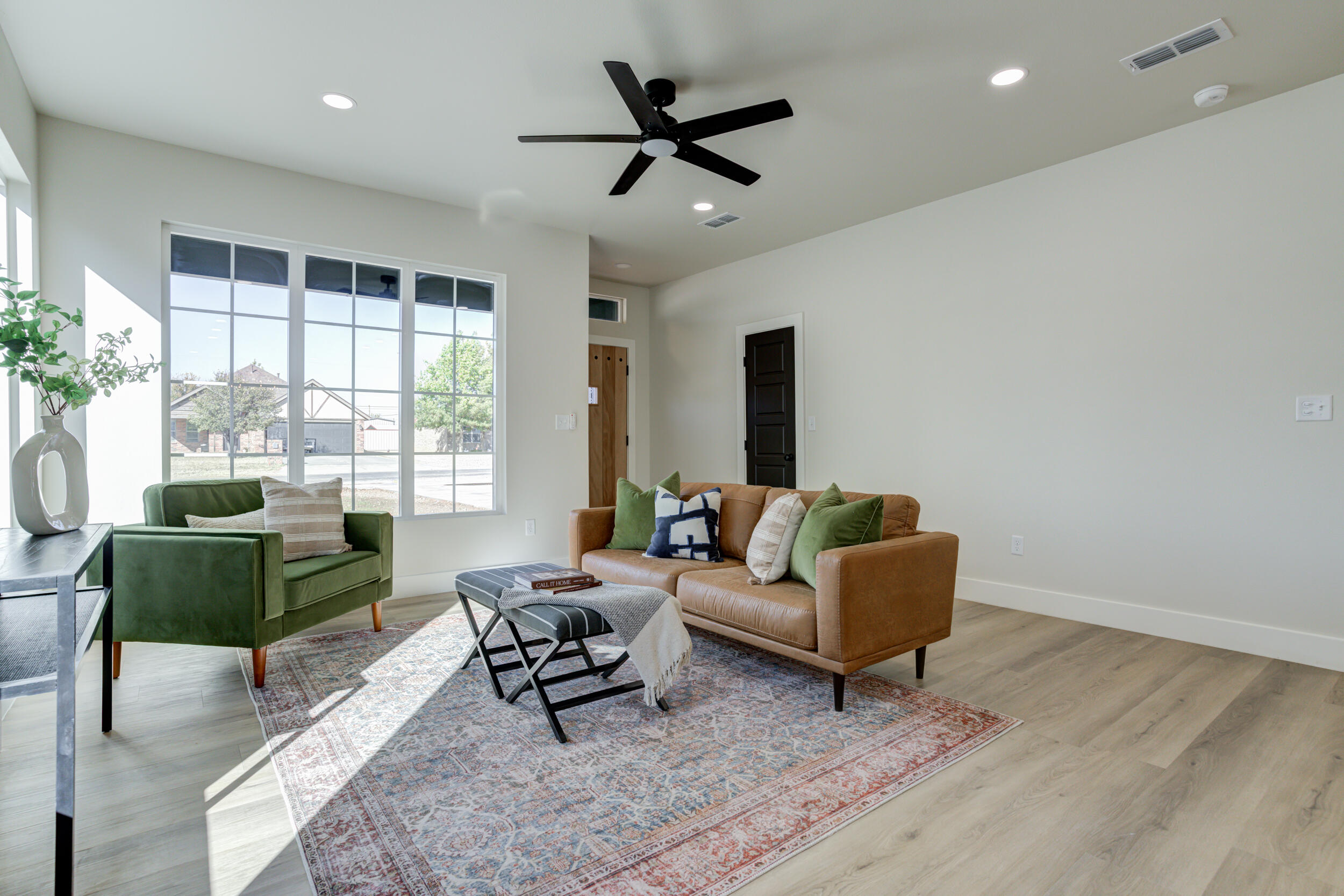 305 Southwest Ave L Seminole, TX 79360 - Photo 11 of 52 a living room with furniture and a window