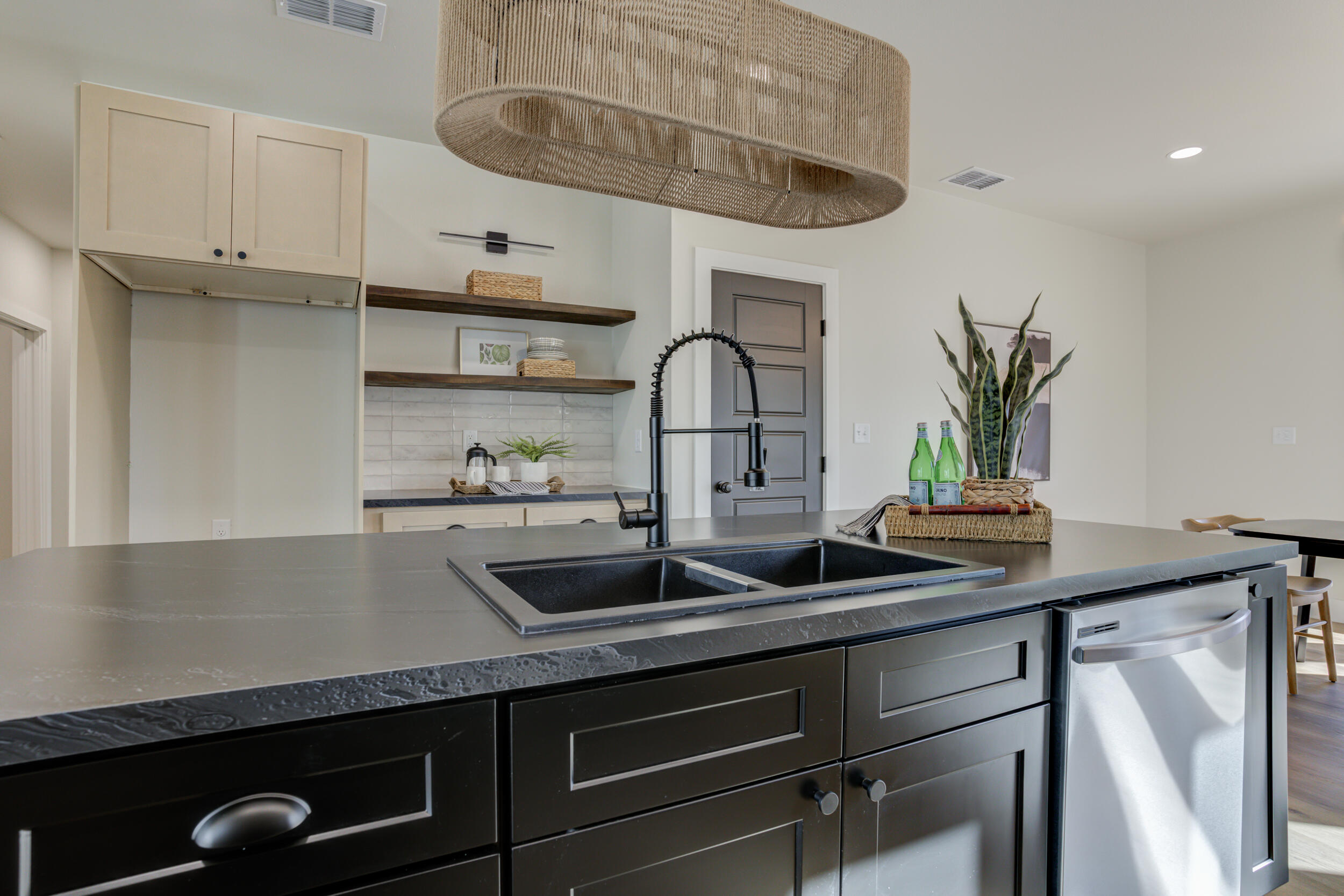 305 Southwest Ave L Seminole, TX 79360 - Photo 20 of 52 a kitchen with a sink and cabinets