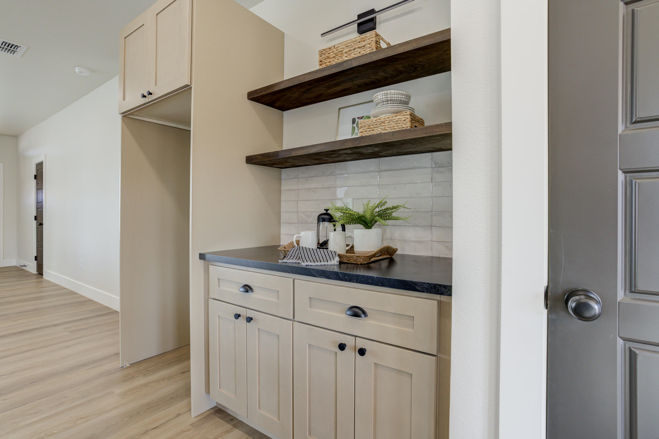 305 Southwest Ave L Seminole, TX 79360 - Photo 21 of 52 a view of cabinets and wooden floor