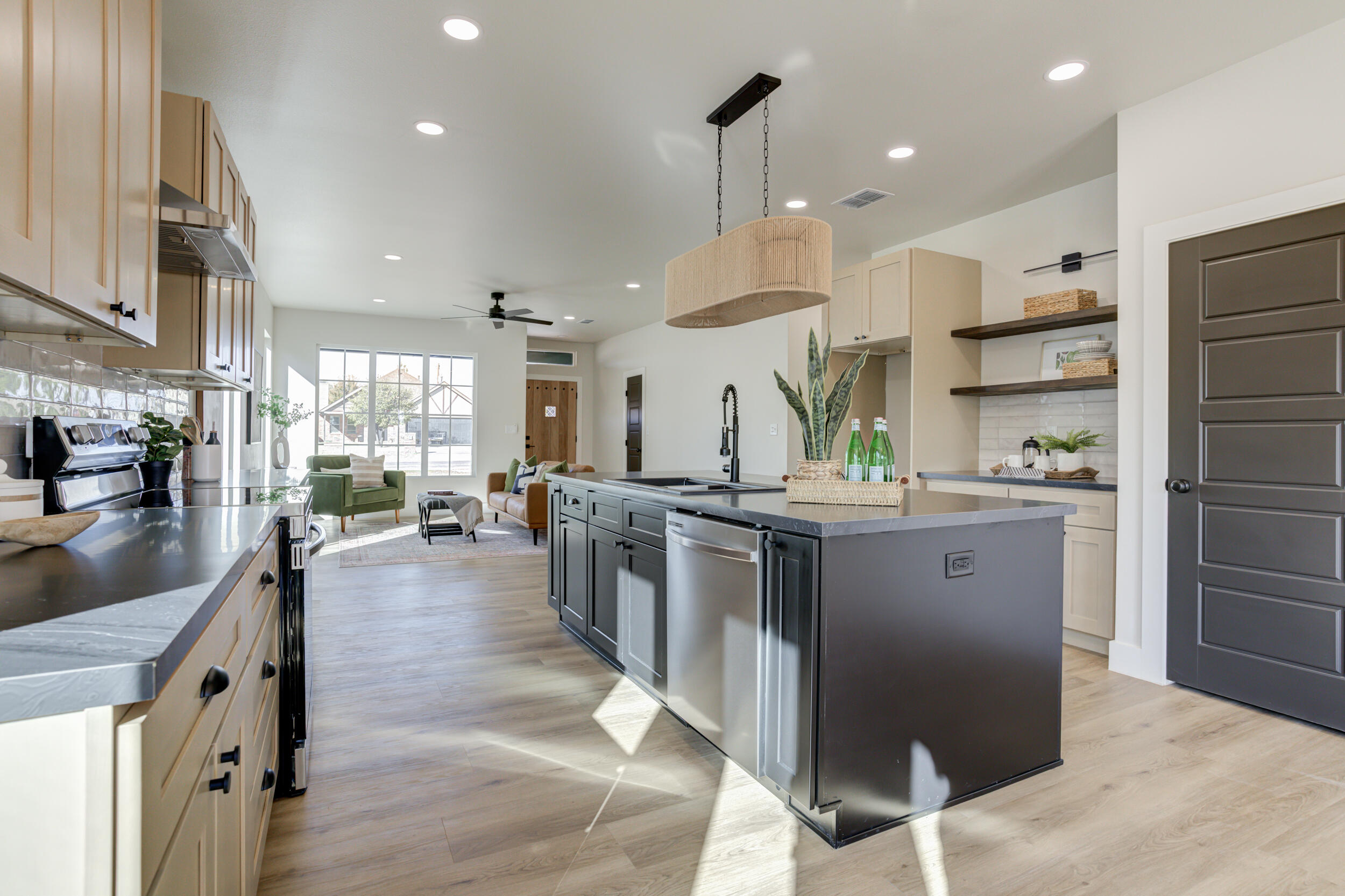 305 Southwest Ave L Seminole, TX 79360 - Photo 24 of 52 a kitchen with counter top space appliances and cabinets