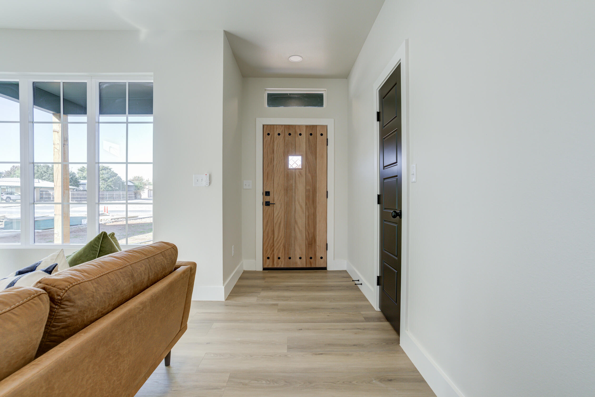305 Southwest Ave L Seminole, TX 79360 - Photo 30 of 52 a living room with furniture and a large window