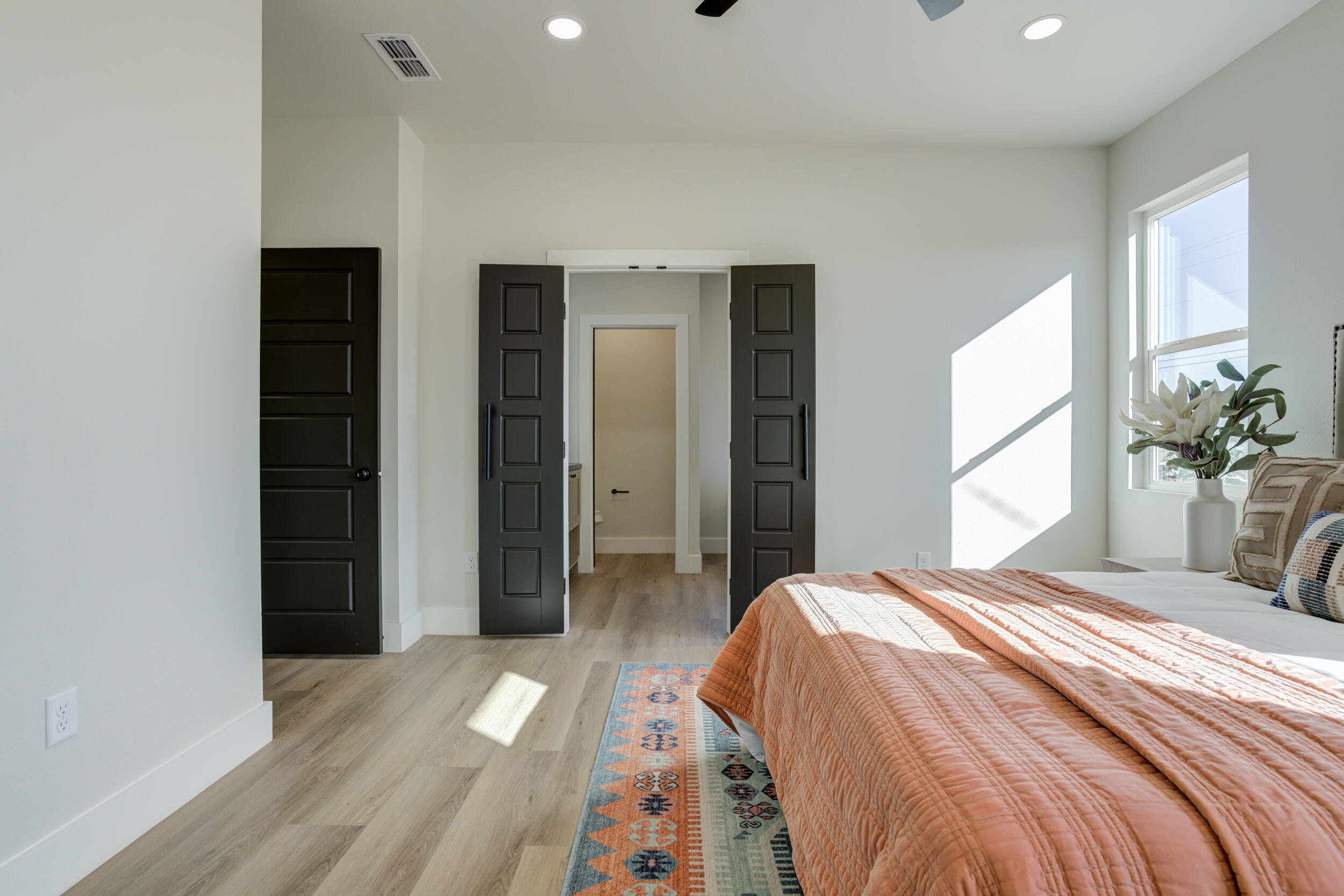 305 Southwest Ave L Seminole, TX 79360 - Photo 40 of 52 a bedroom with a bed and a large window