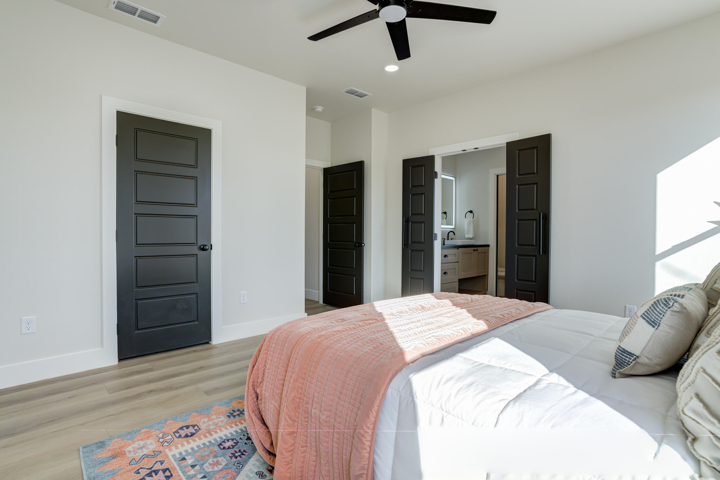 305 Southwest Ave L Seminole, TX 79360 - Photo 41 of 52 a bedroom with a bed and a dresser