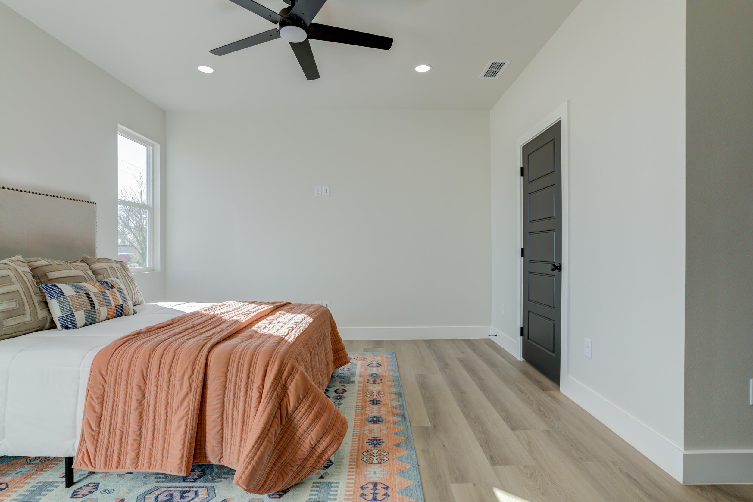 305 Southwest Ave L Seminole, TX 79360 - Photo 42 of 52 a bedroom with two beds and painted walls
