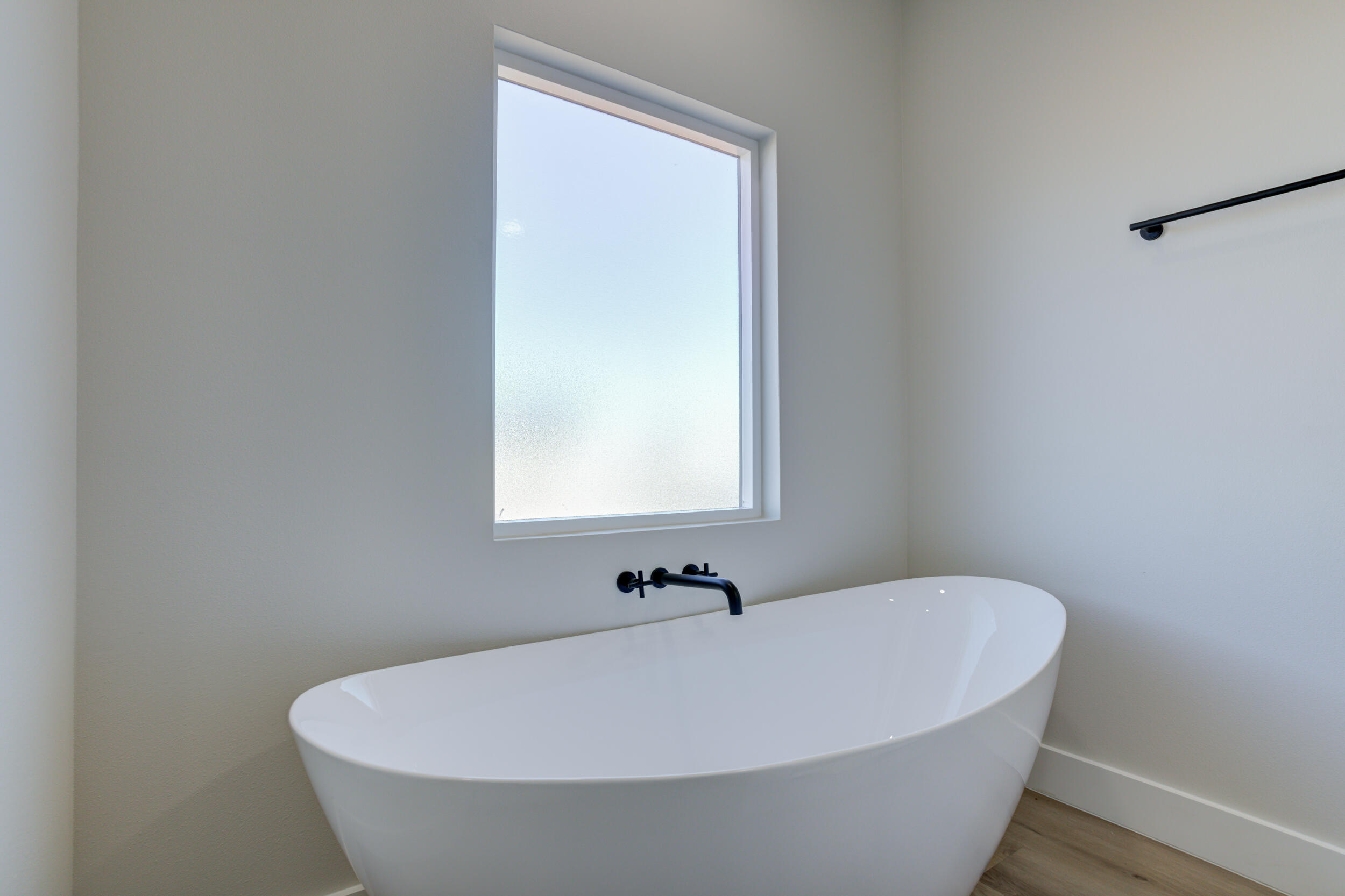 305 Southwest Ave L Seminole, TX 79360 - Photo 46 of 52 a white bath tub sitting in a bathroom