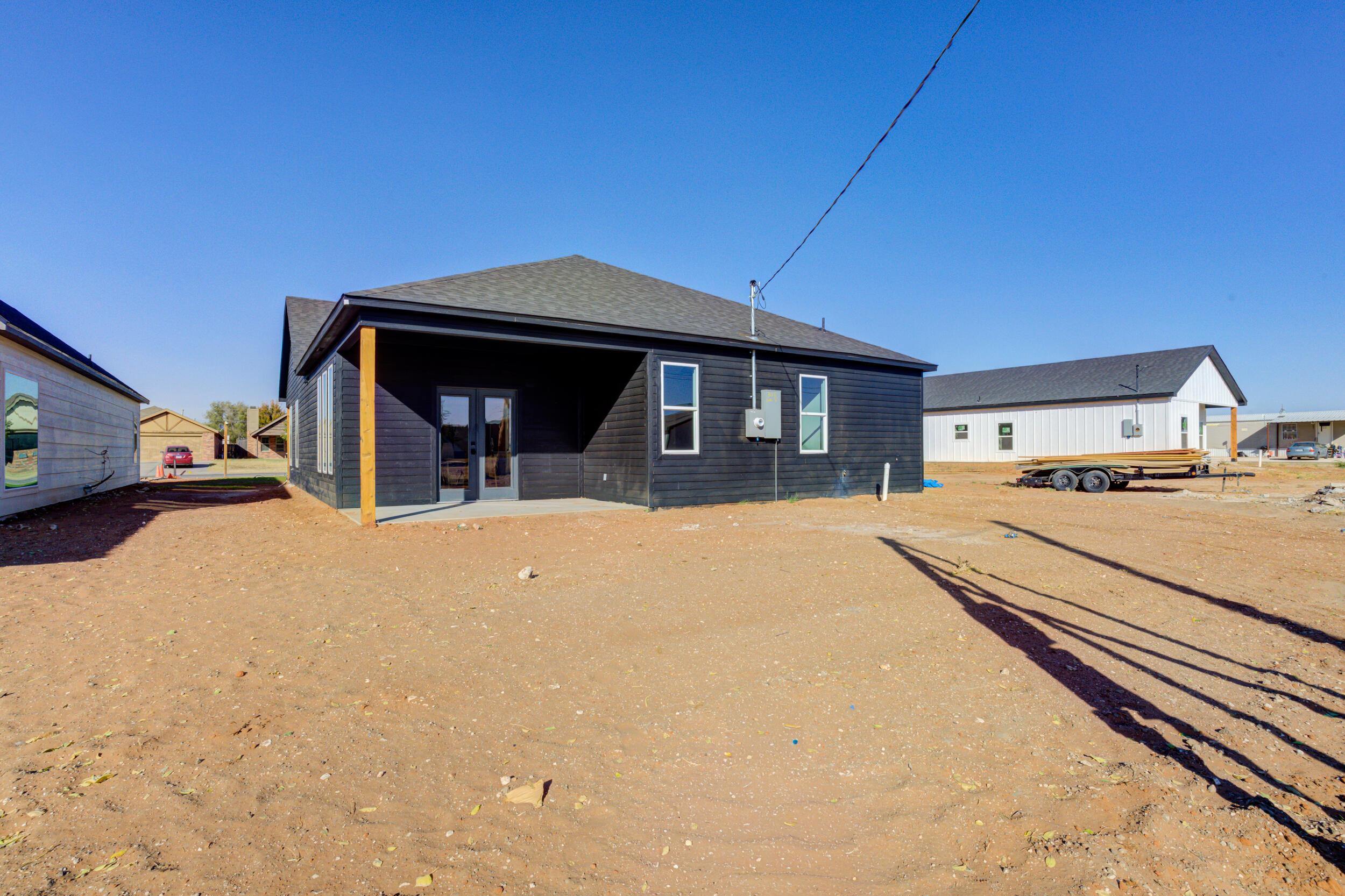 305 Southwest Ave L Seminole, TX 79360 - Photo 52 of 52 a front view of a house with cars parked