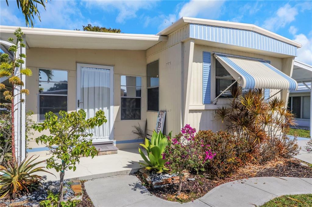 143 Moorhead Manor, Unit 143 Naples, FL 34112 - Photo 4 of 35 Doorway to property
