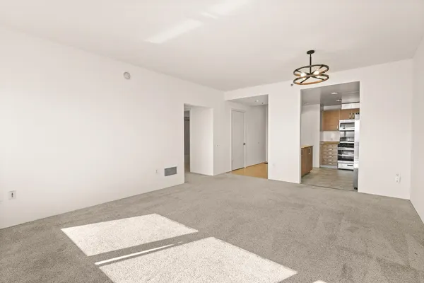 a view of a livingroom with a staircase