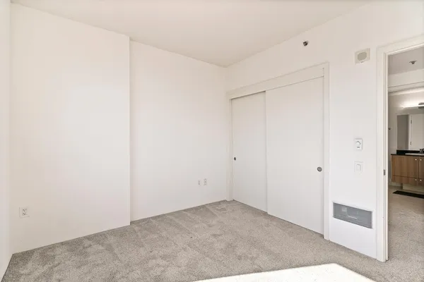 a view of a room with a hallway