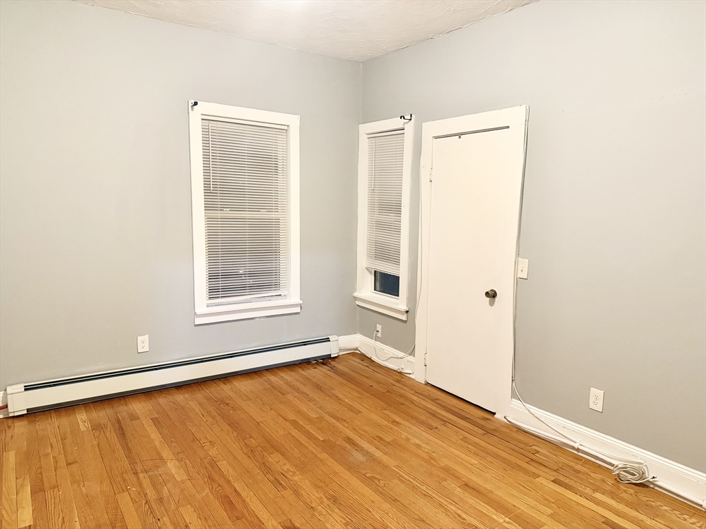 14 Addison Avenue, Unit 2 Brockton, MA 02302 - Photo 4 of 7 a view of an empty room with a window