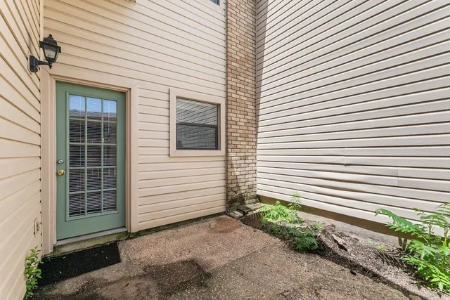 a view of a house with a white door
