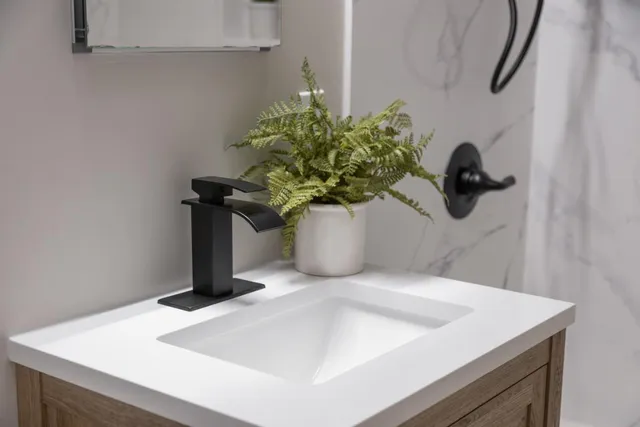 a vase of flowers sitting on a table