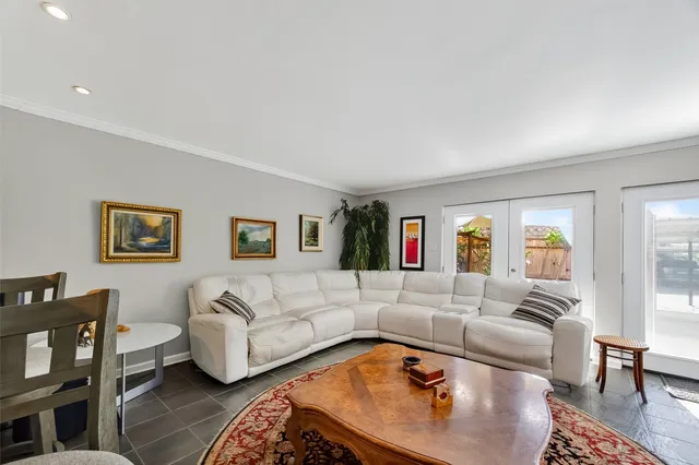 a living room with furniture and a couch