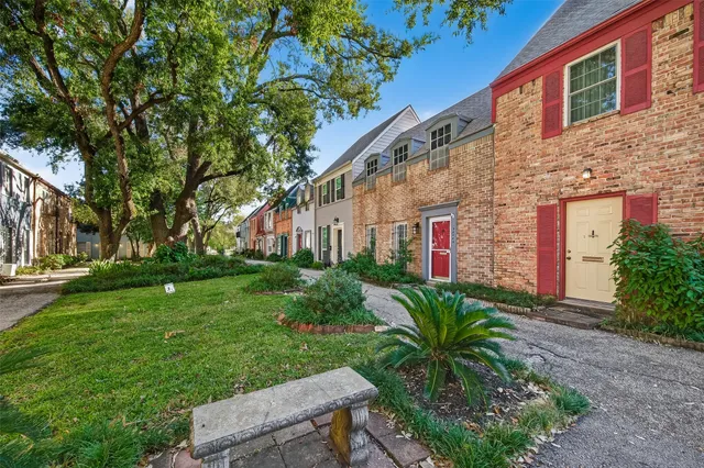 a house view with a garden space