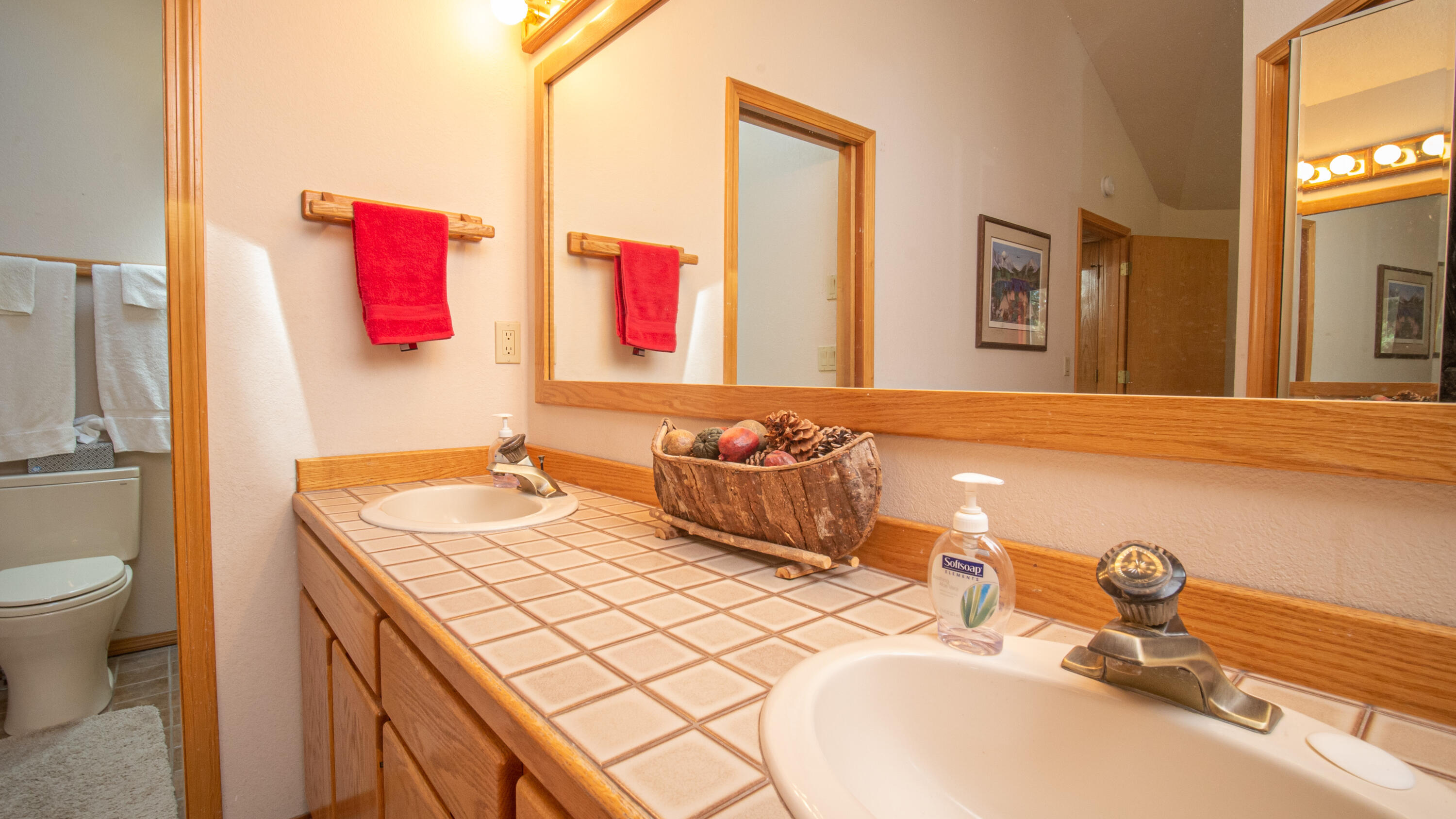 17932 Rhododendron Lane Sunriver, OR 97707 - Photo 12 of 32 The Primary Suite bath has a large dressing area, walk-in closet, and a skylight in the bath.