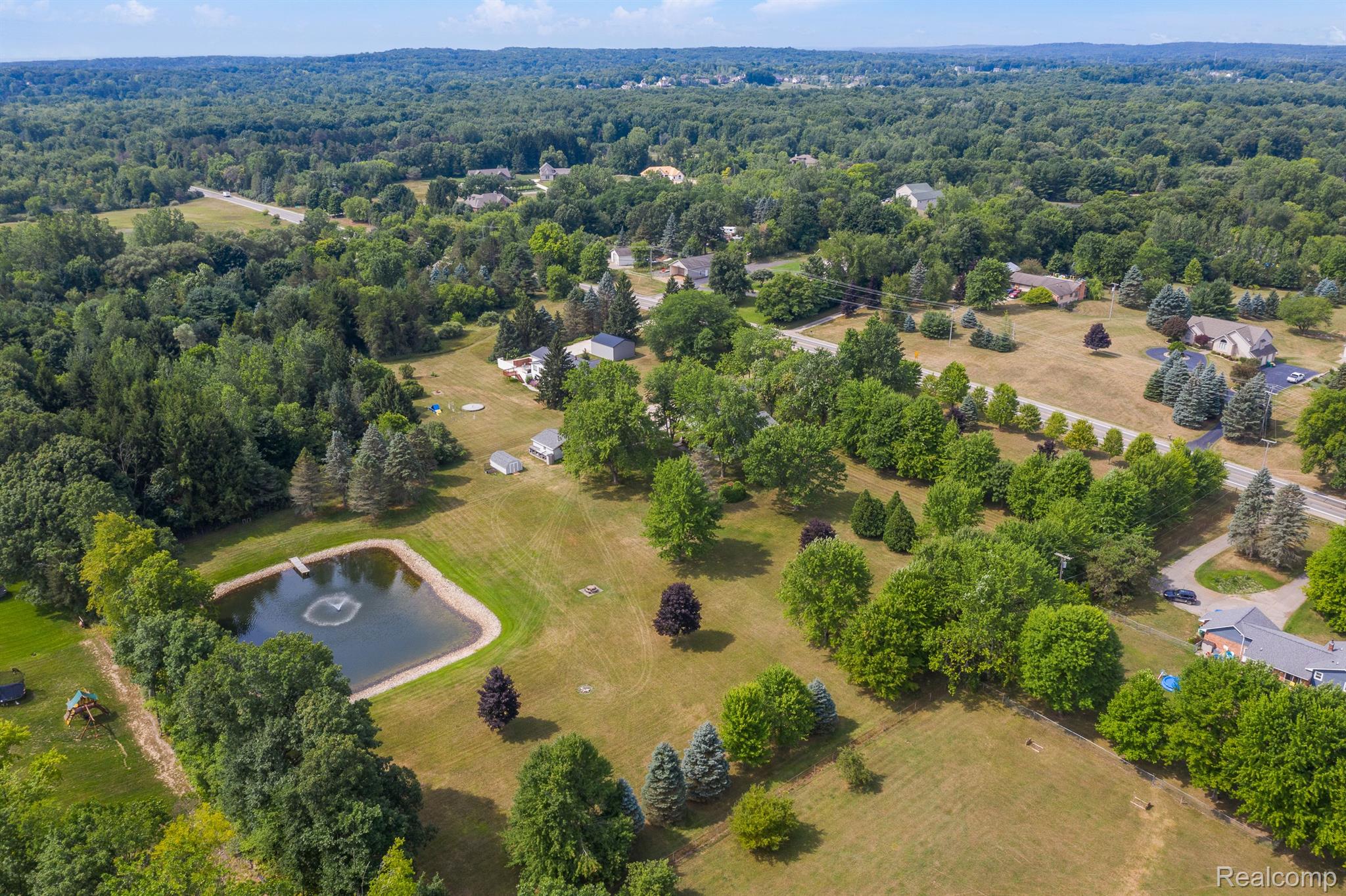 1635 South Baldwin Road Oxford, MI 48371 - Photo 63 of 74 Stocked pond