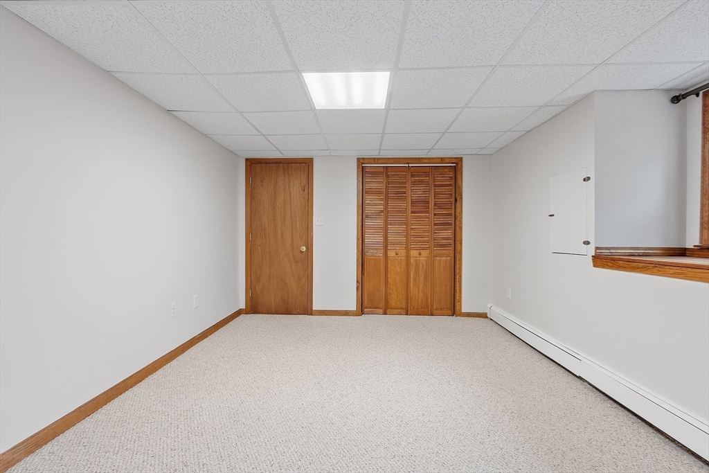 14 October Lane Stow, MA 01775 - Photo 31 of 41 an empty room with windows