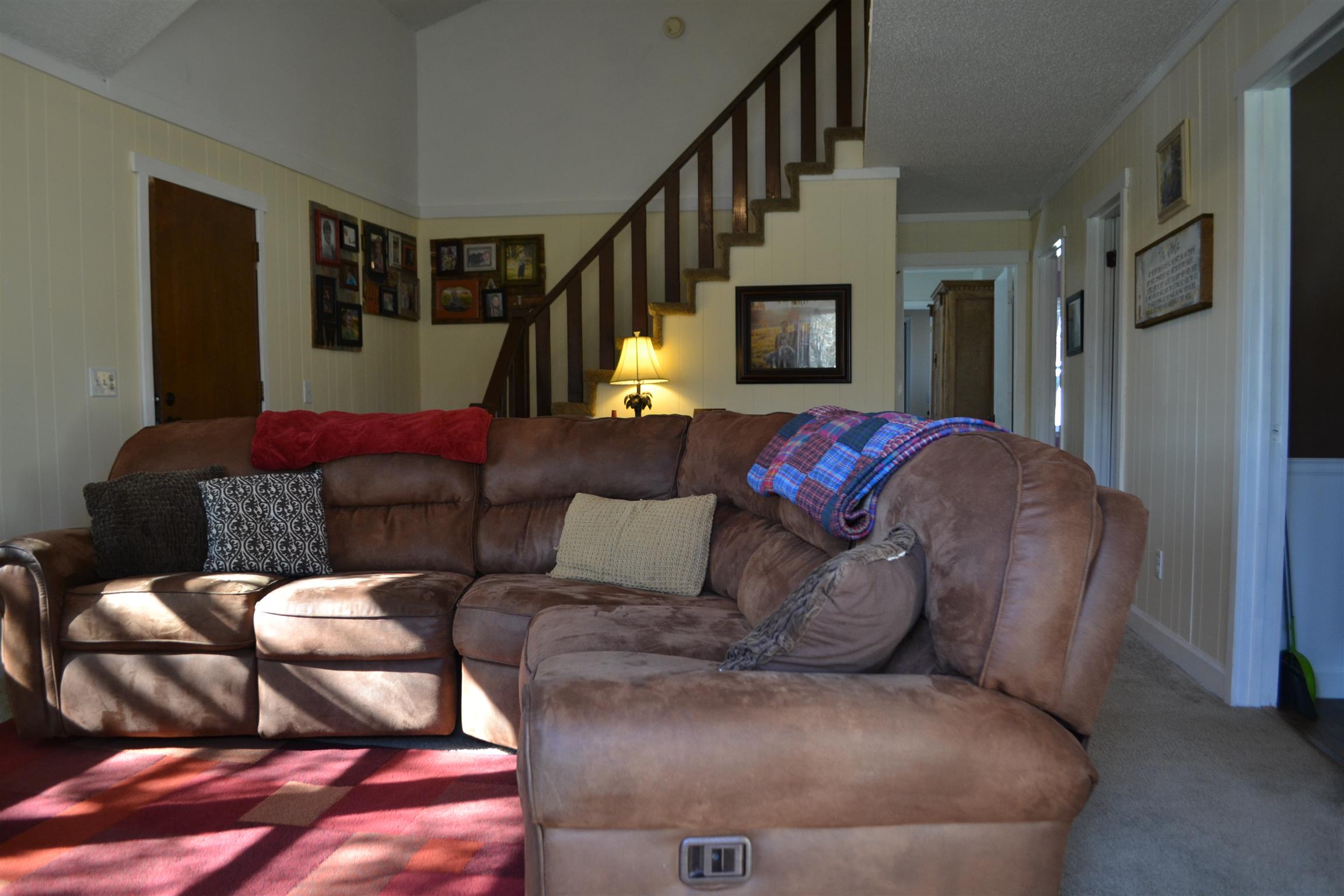 915 Hamilton Chambers Road Lebanon, TN 37087 - Photo 14 of 18 a living room with furniture and a fireplace