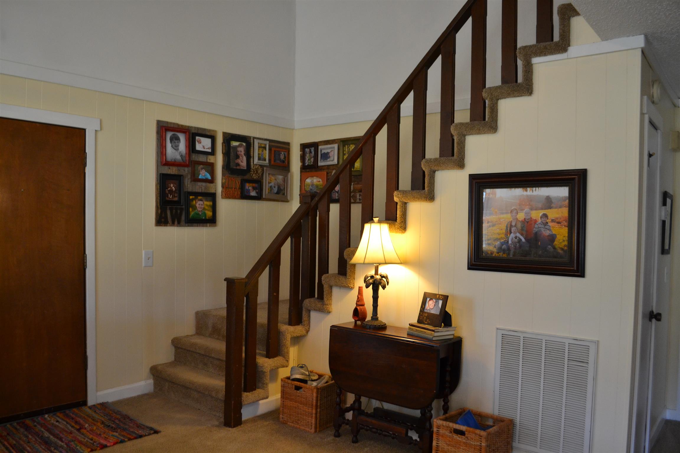 915 Hamilton Chambers Road Lebanon, TN 37087 - Photo 10 of 18 a view of entryway with wooden floor and stairs