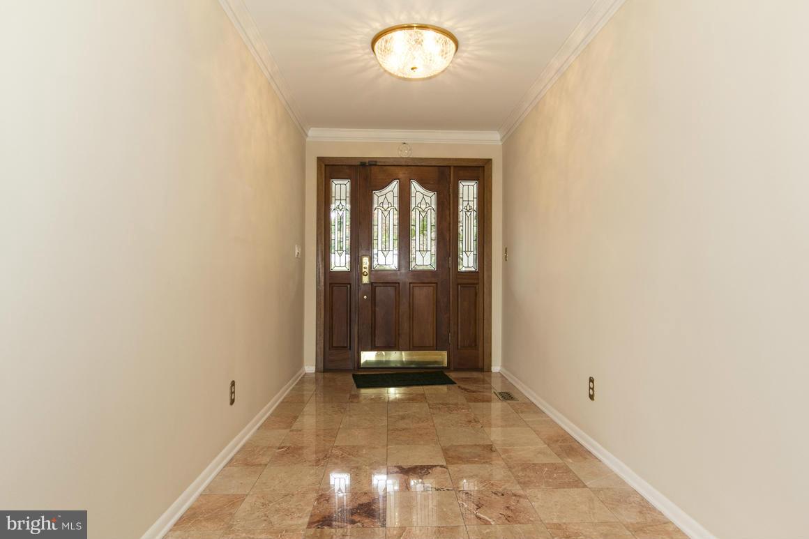 9911 Pepper Hill Road Perry Hall, MD 21128 - Photo 2 of 30 an empty room with wooden floor and windows