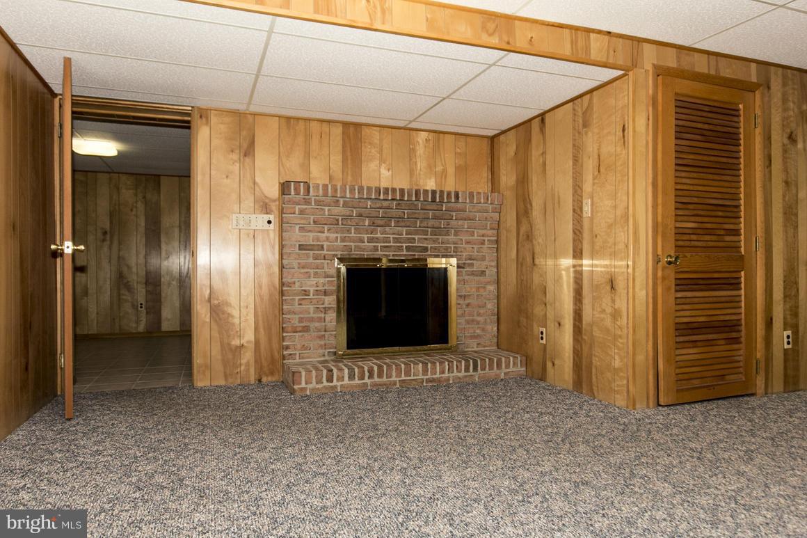9911 Pepper Hill Road Perry Hall, MD 21128 - Photo 15 of 30 a view of an empty room with a fireplace