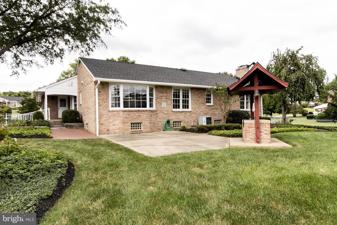 9911 Pepper Hill Road Perry Hall, MD 21128 - Photo 29 of 30 a front view of a house with yard patio and green space
