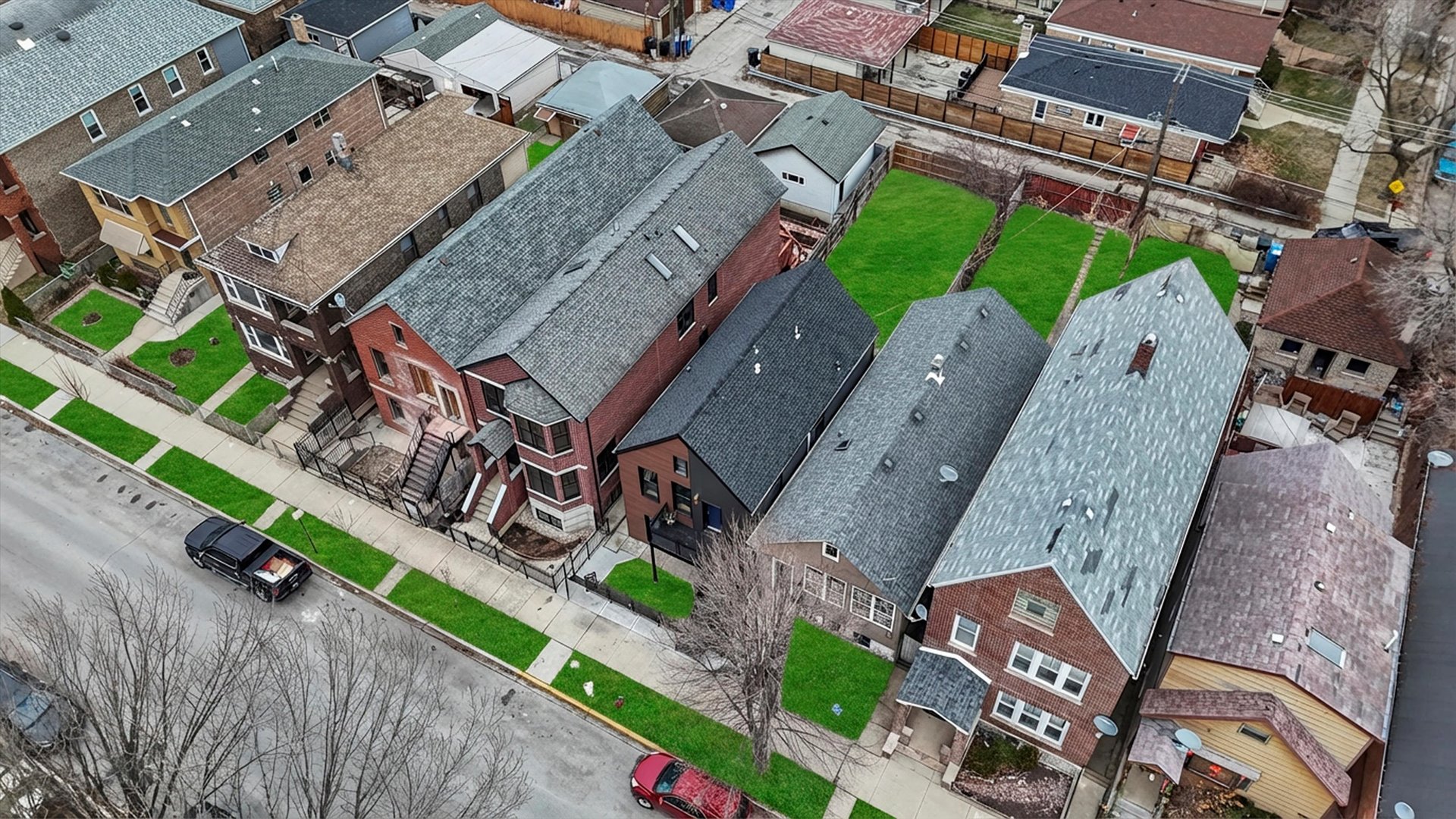 1040 West 34th Place Chicago, IL 60608 - Photo 4 of 8 an aerial view of a house with a garden