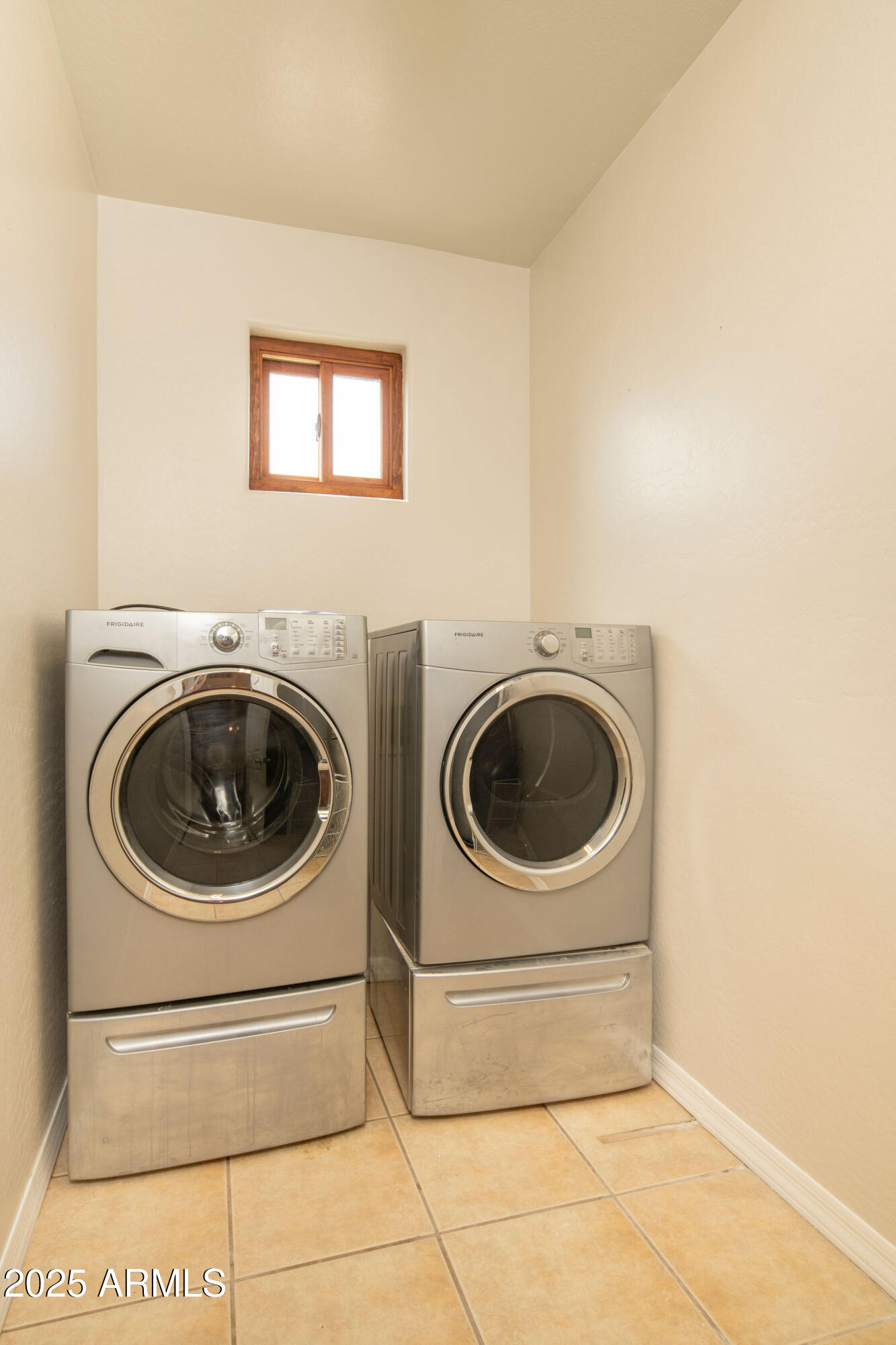 29362 North Varnum Road San Tan Valley, AZ 85143 - Photo 11 of 27 a utility room with dryer and washer