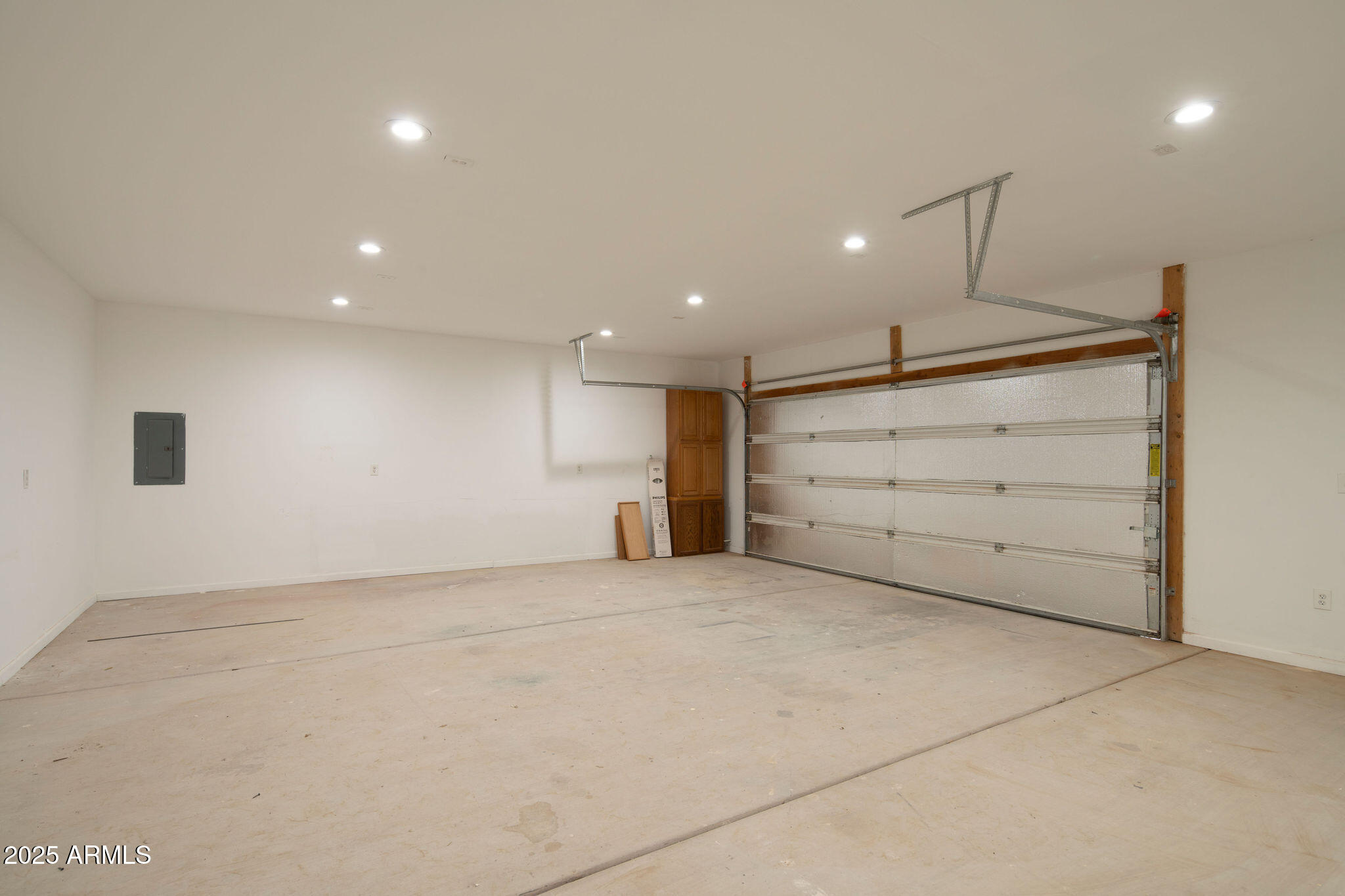 29362 North Varnum Road San Tan Valley, AZ 85143 - Photo 12 of 27 an empty room with a cabinet and mirrors