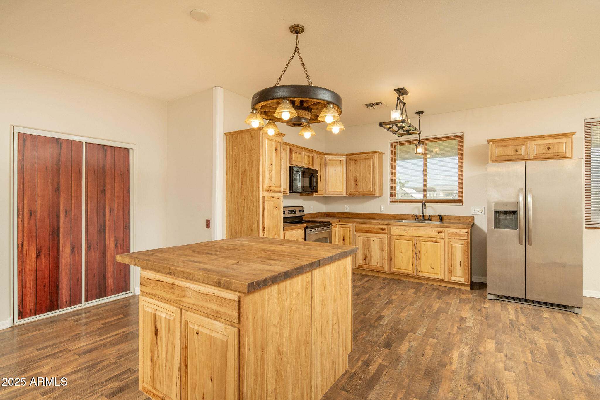 29362 North Varnum Road San Tan Valley, AZ 85143 - Photo 15 of 27 a kitchen with white cabinets and white appliances