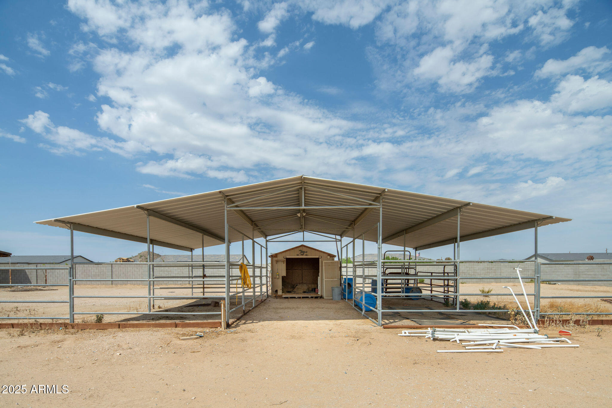 29362 North Varnum Road San Tan Valley, AZ 85143 - Photo 27 of 27 a backyard of a house with table and chairs