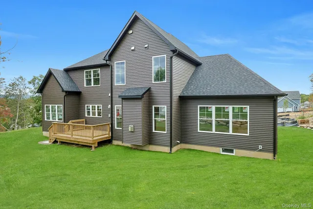 an aerial view of a house with a garden