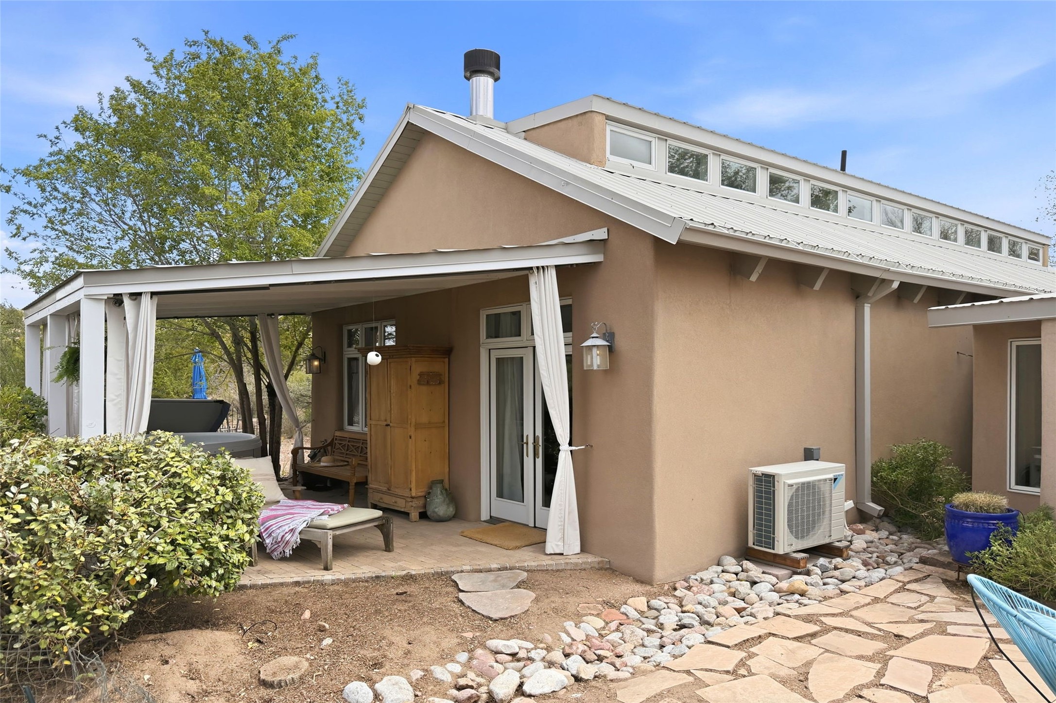 55 Paseo Del Rancho Santa Fe, NM 87506 - Photo 52 of 61 Patio with hot tub off of primary suite