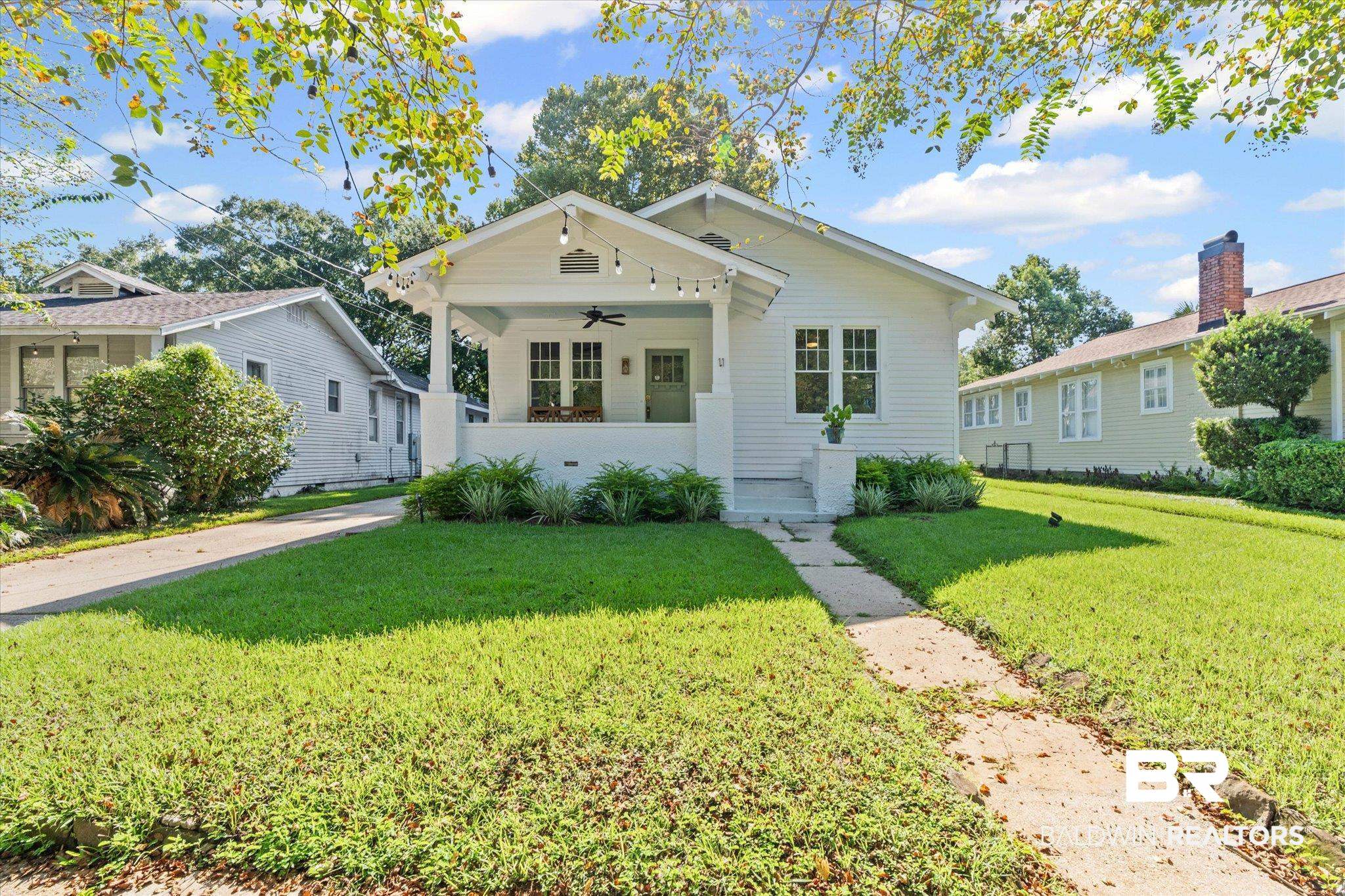 11 South Lafayette Street Mobile, AL 36604 - Photo 1 of 20 Bungalow-style house with ceiling fan, a front yard, and a porch