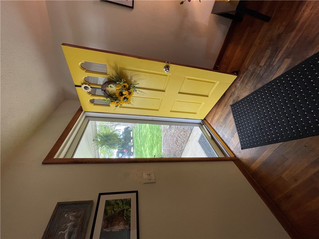 360 Ridge Street Piqua, OH 45356 - Photo 4 of 46 A welcoming entry features hardwood floors, inviting you to step inside.