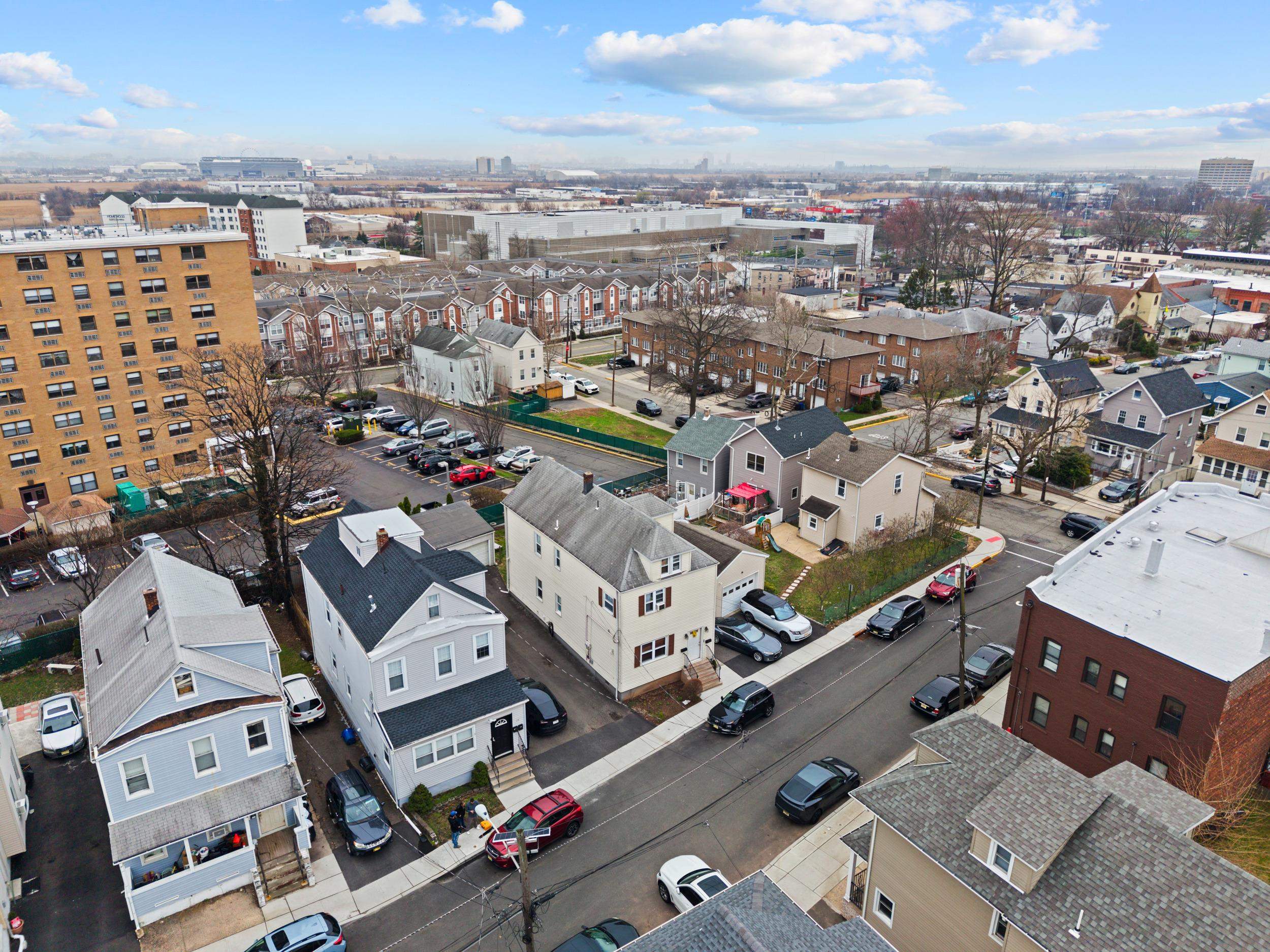 3 Edison Place, Unit 1 East Rutherford, NJ 07073 - Photo 21 of 21 an aerial view of residential building with parking
