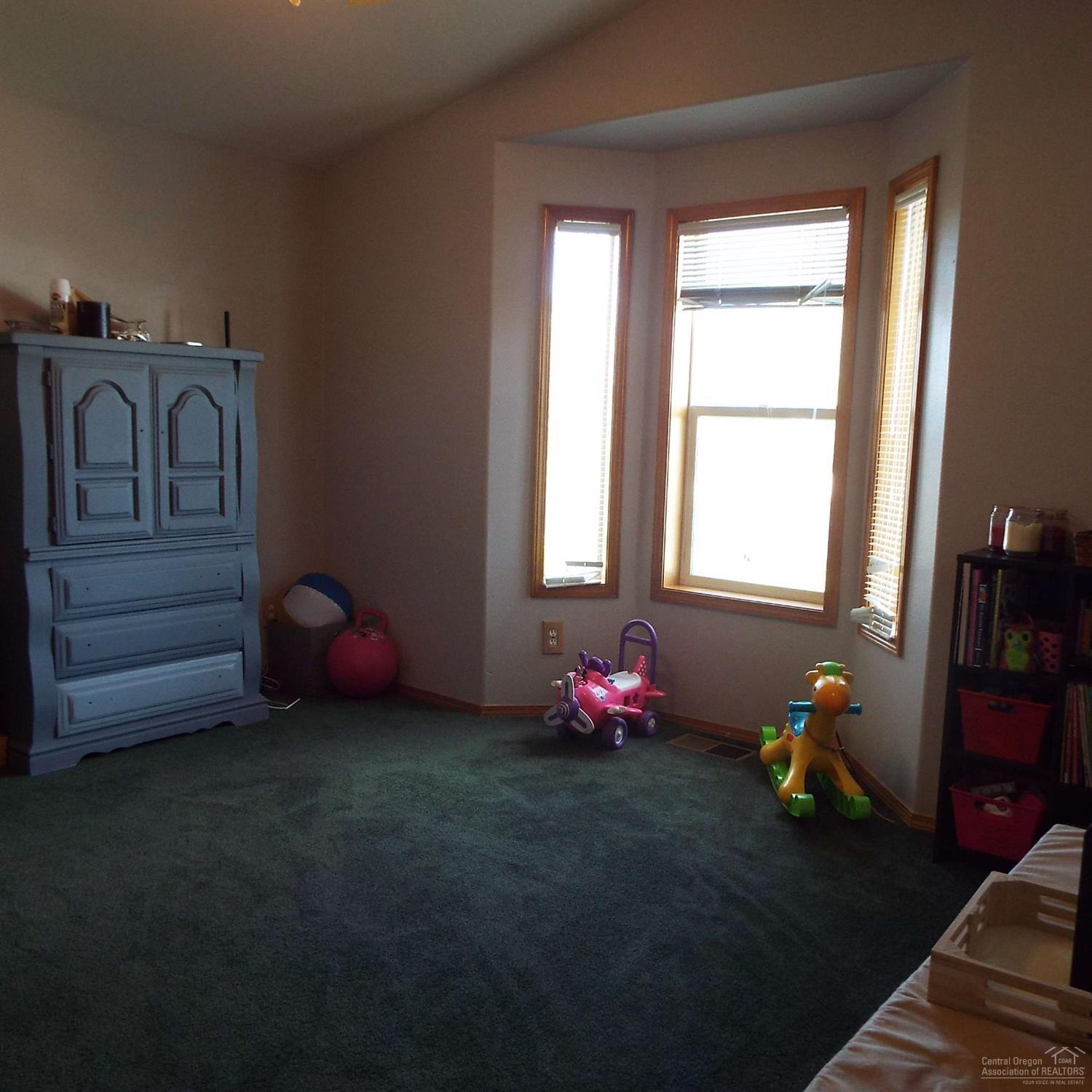 387 Center Ridge Drive Culver, OR 97734 - Photo 9 of 24 This large room is located at the front