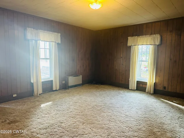 an empty room with windows