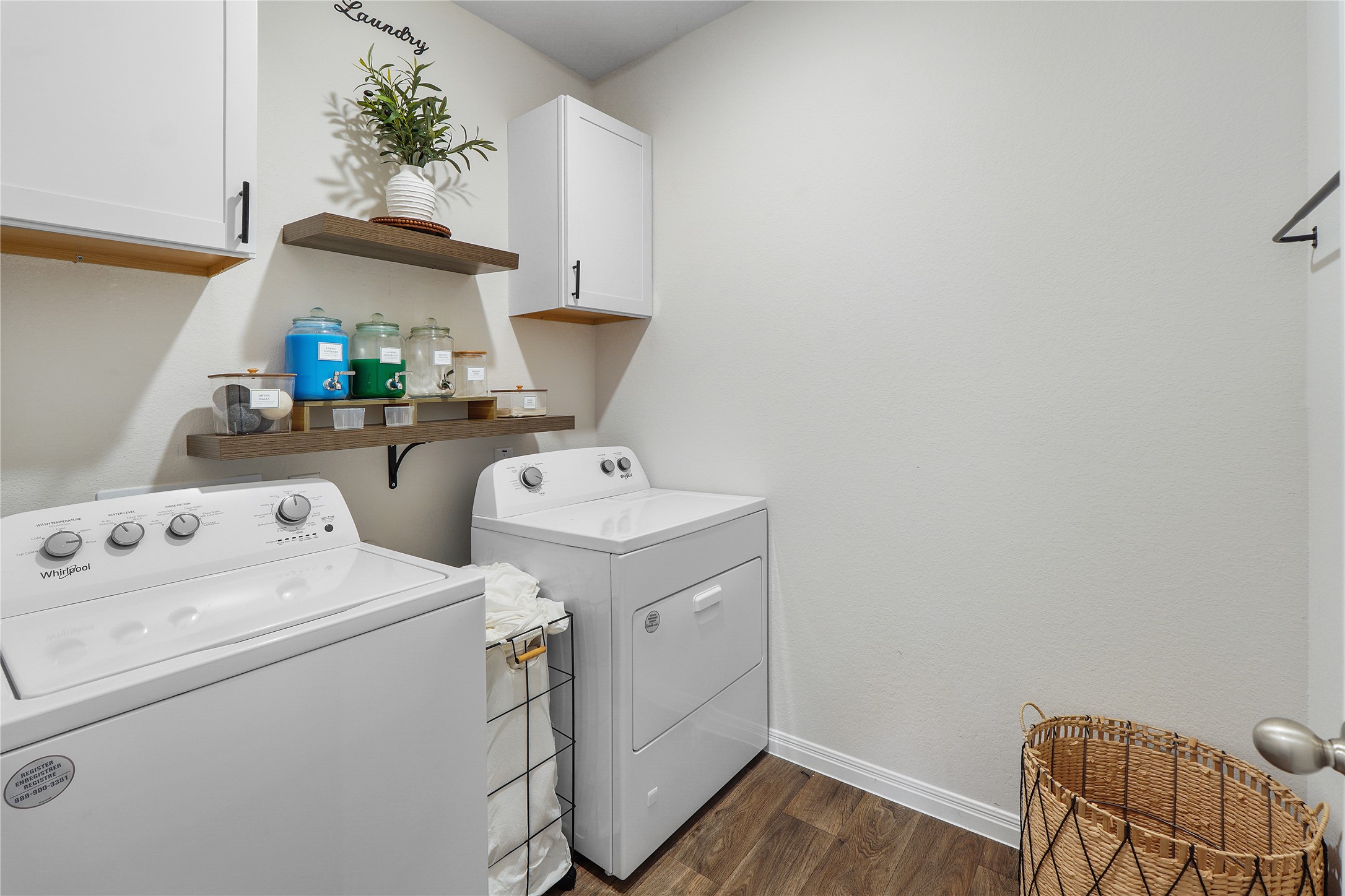 217 Evergreen Sumac Loop Kyle, TX 78640 - Photo 20 of 20 Functional utility room with ample storage and robust laundry appliances.