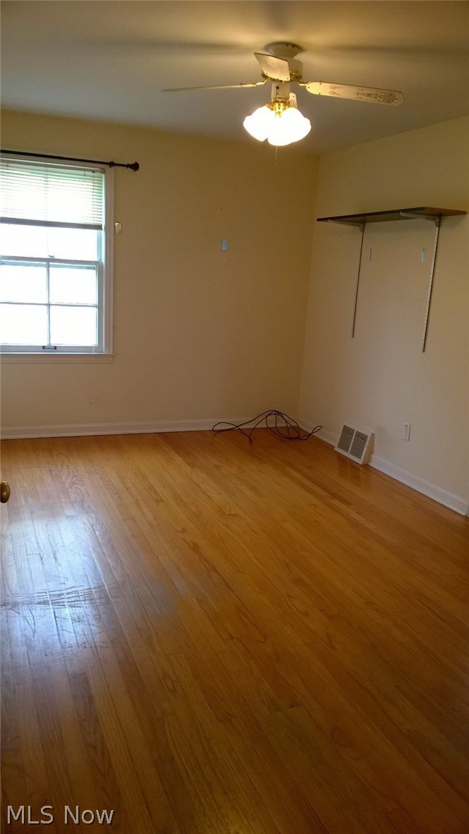 1189 Avondale Road Cleveland, OH 44121 - Photo 12 of 19 Gleaming hardwood in all bedrooms, plus ceiling fans!