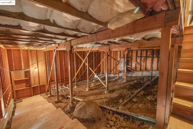 a view of under construction room and staircase