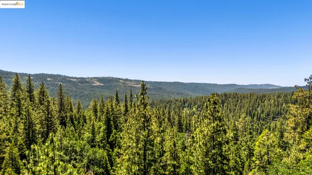 a view of mountain with lake view