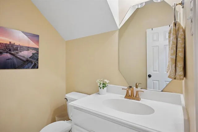 a bedroom with a bed and flat screen tv