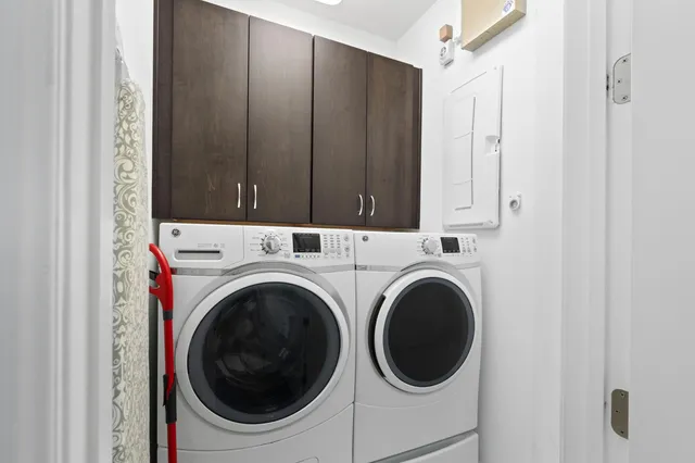 a view of kitchen with granite counter top and oven