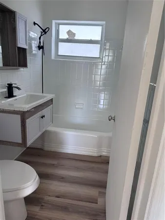 a bathroom with a sink and a bathtub
