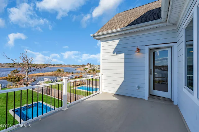 a bathroom with a toilet a sink and a window
