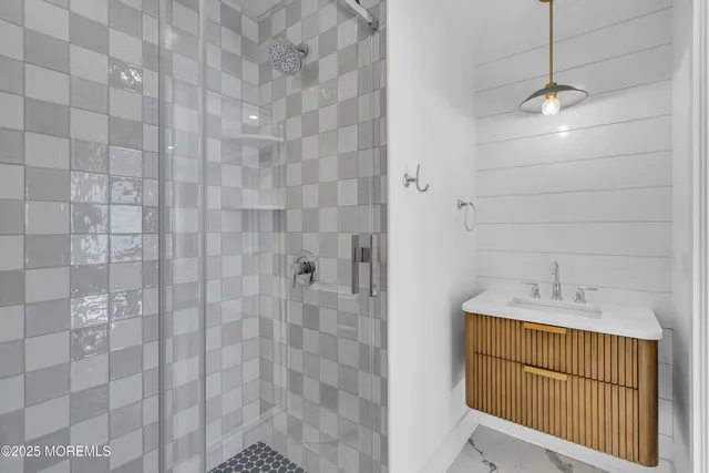 a view of a hallway with stairs