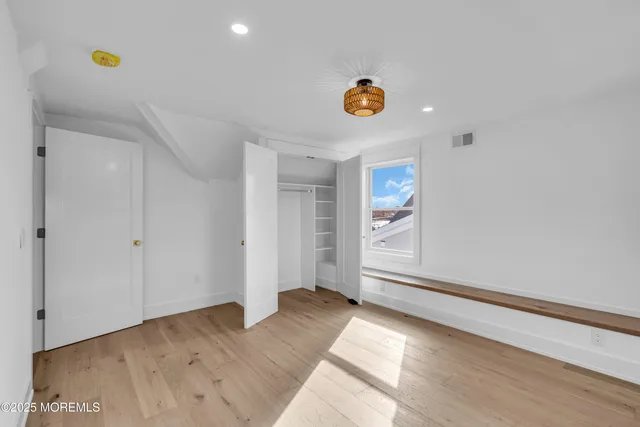 a view of house with yard and green space